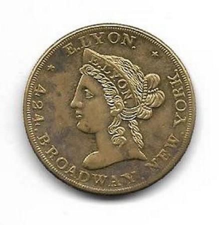 NY-507 E. Lyon Trade Token, obverse