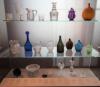 Display Case of Antique Bottles and Glass