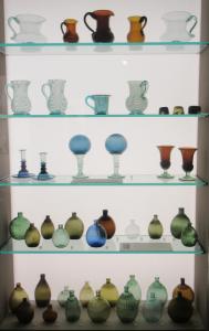 Display Case of Antique Bottles & Glass