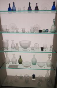 Display Case of Antique Bottles & Glass