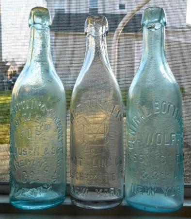 Phoenix Bottling Company, Bottlers For Clausen & Son Brewing Co. 301 & 303 E. 47th St., Metropolis Bottling Co., 119 Chrystie St., A. Wolff, Central Bottling Co., E. 55th St. Bet 2nd & 3rd Aves., all NYC